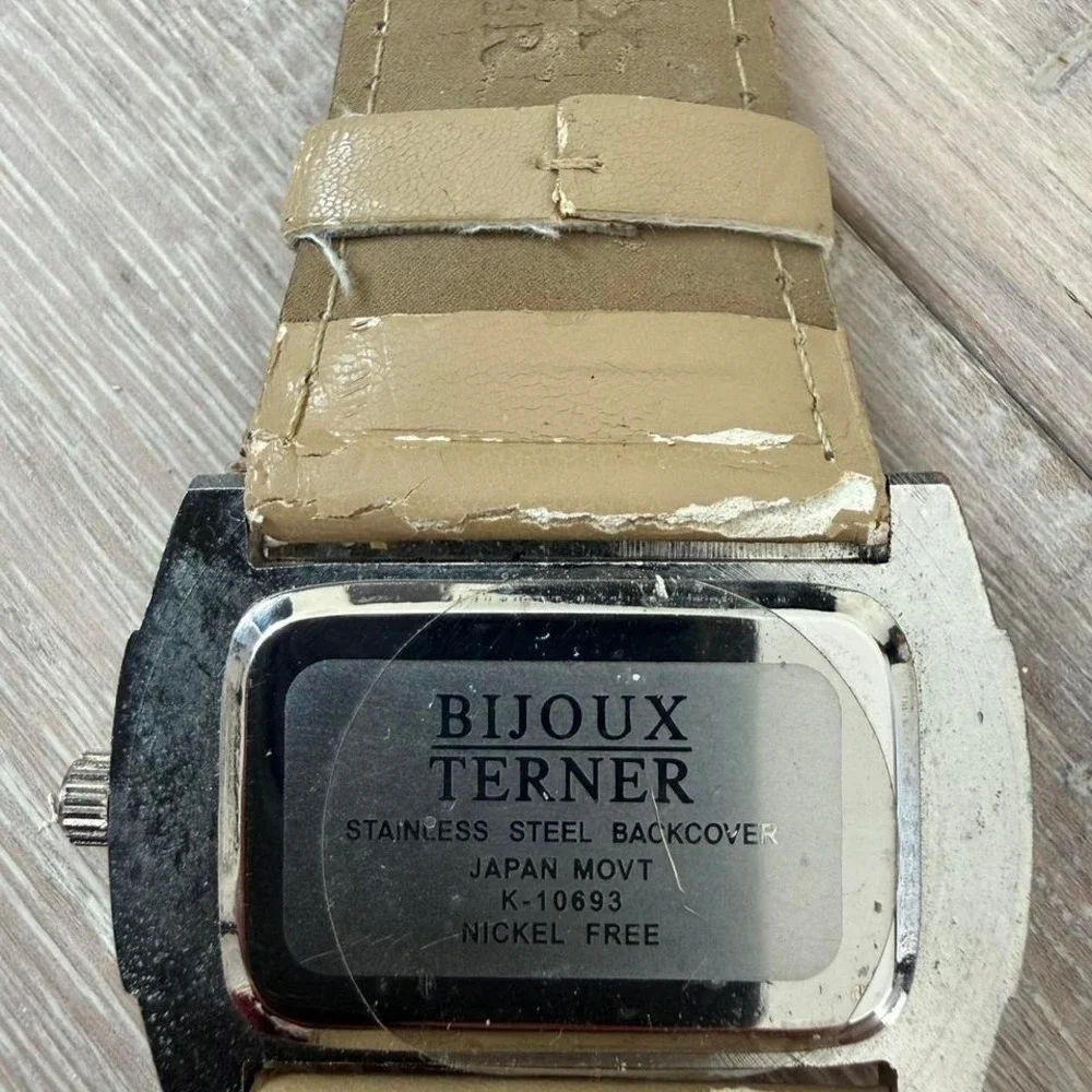 Tan leather watch with silver accents